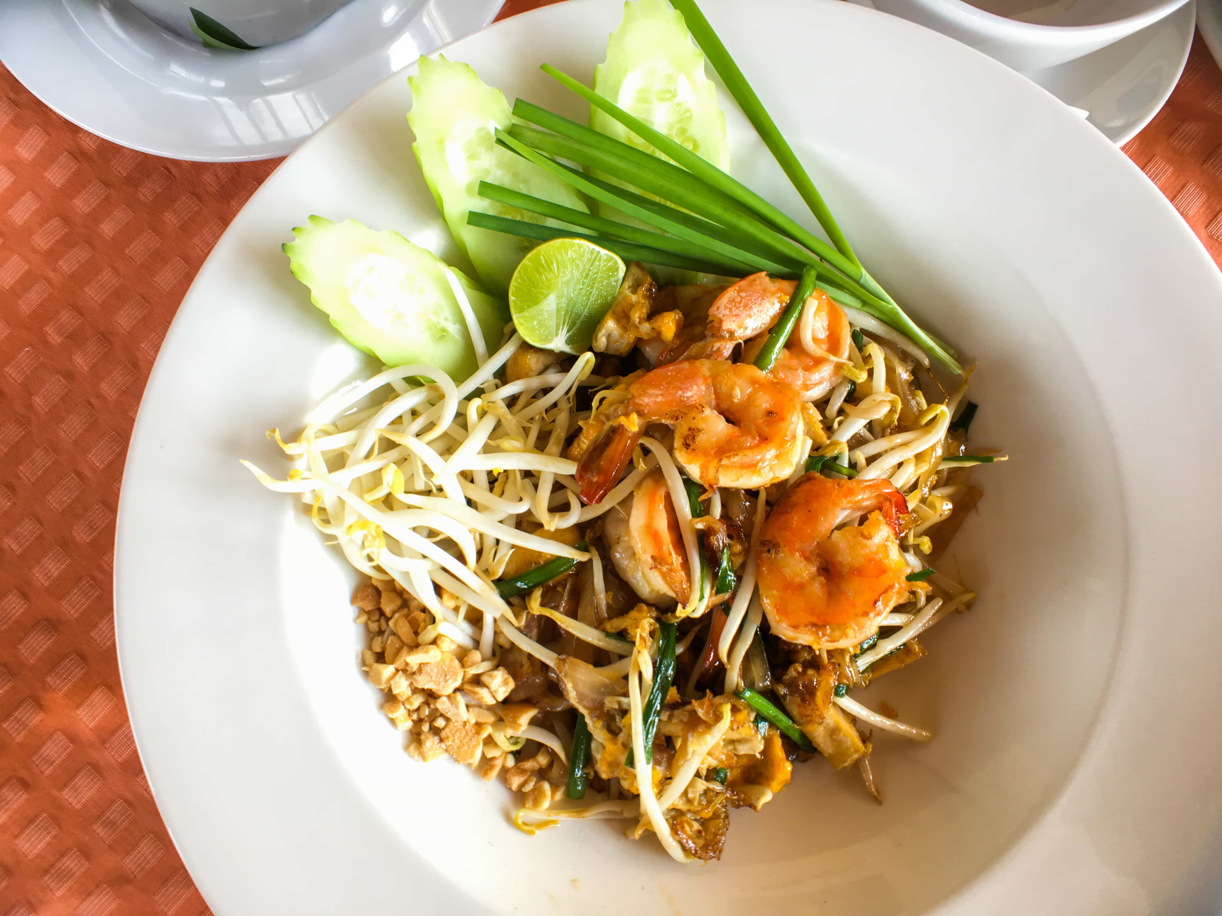 6 Tourist Traps to Avoid in Phuket Thailand And How To Avoid Them 8 6 Tourist Traps to Avoid in Phuket And How To Avoid Them, best thai food, thai dishes, thai food, This is the main dish in Thailand, noodles with seafood or pork and vegetables and we enjoyed it in Riva Arun Bangkok.