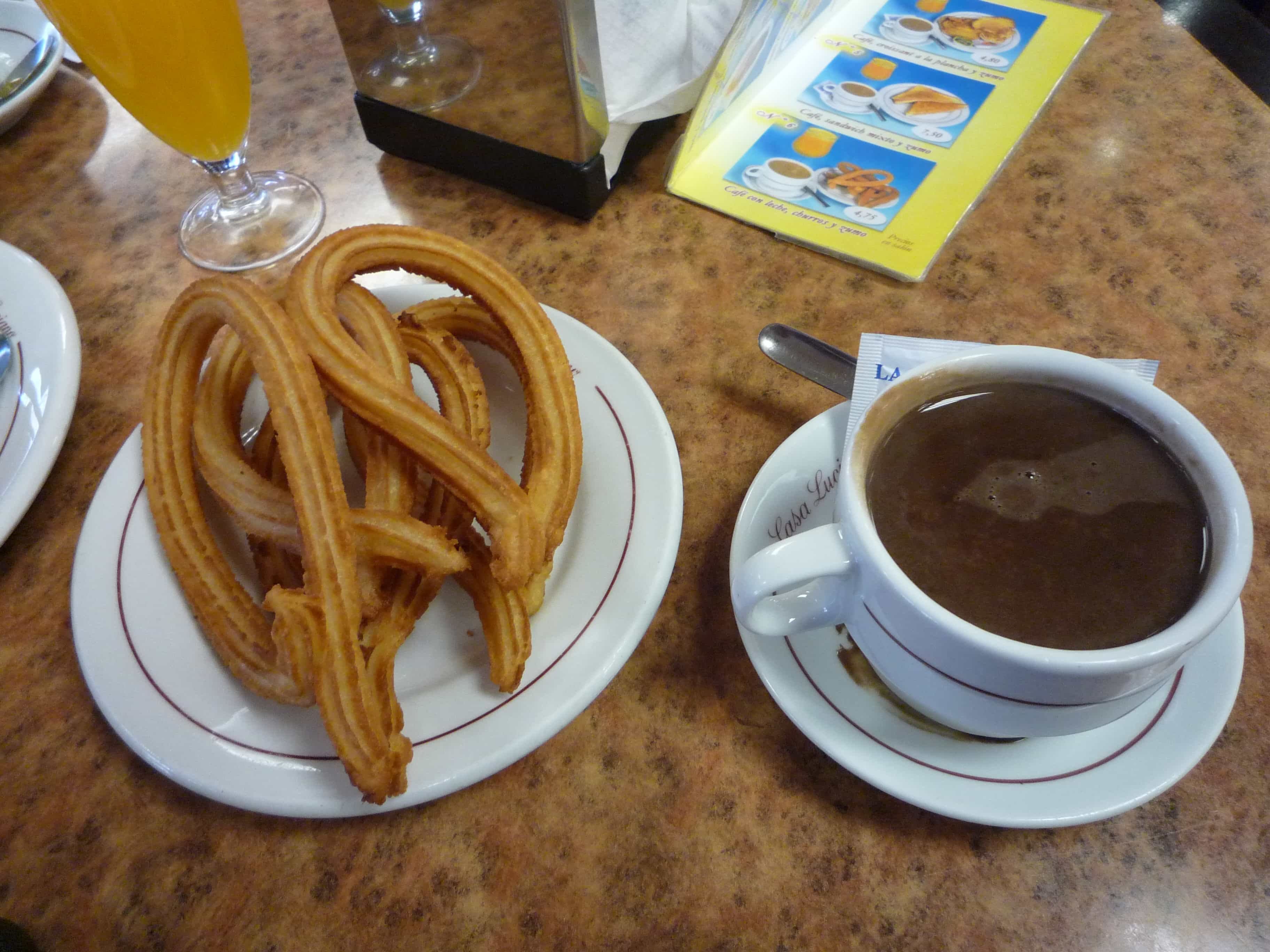 Chocolate with churros, places to visit in Madrid, Madrid travel guide, things to do in Madrid