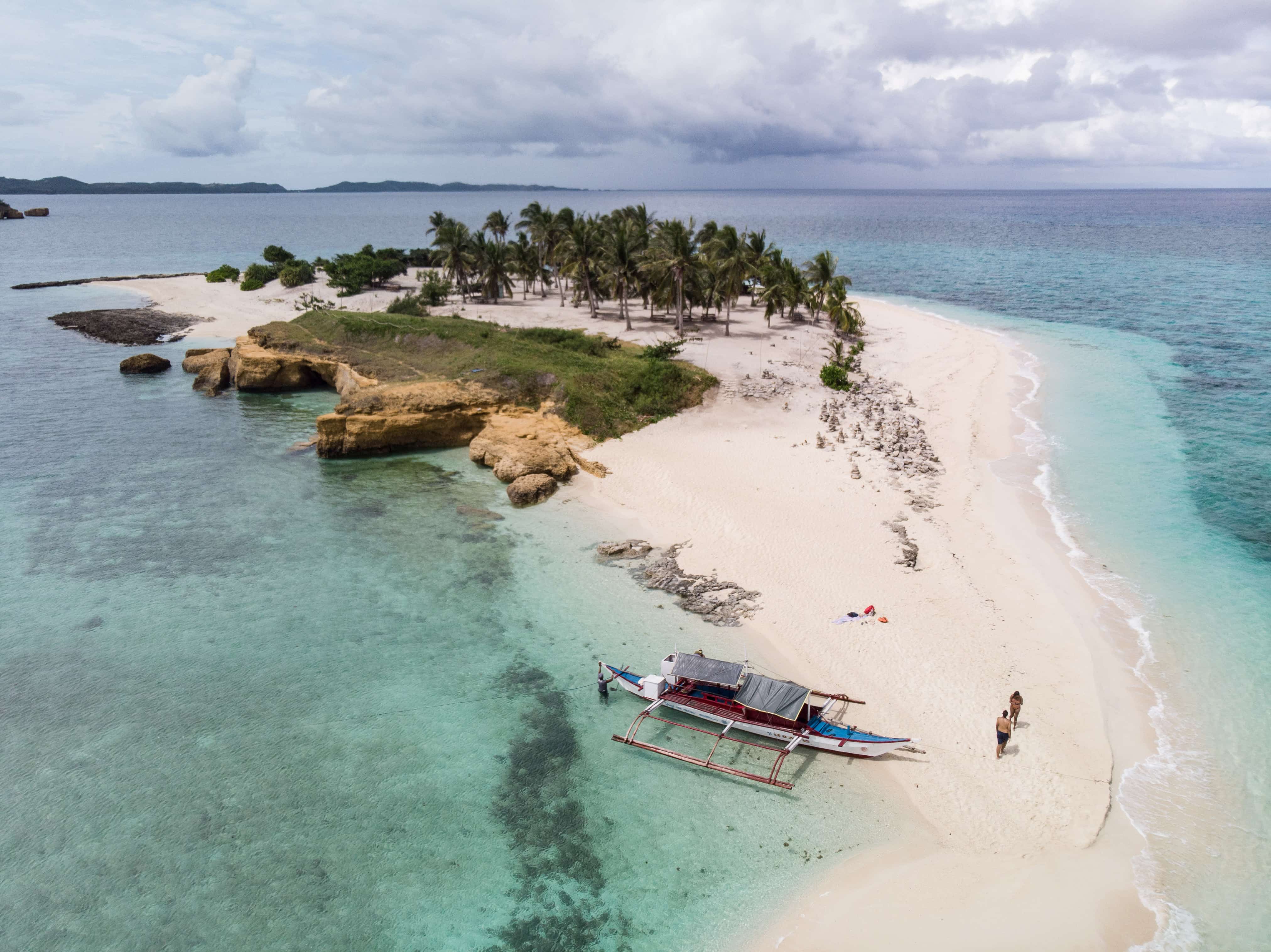 15 Best Bicol Tourist Spots And Things to do in Bicol (Travel Guide) 13 Burias Island tour, Burias Island travel guide, Tinalisayan Island