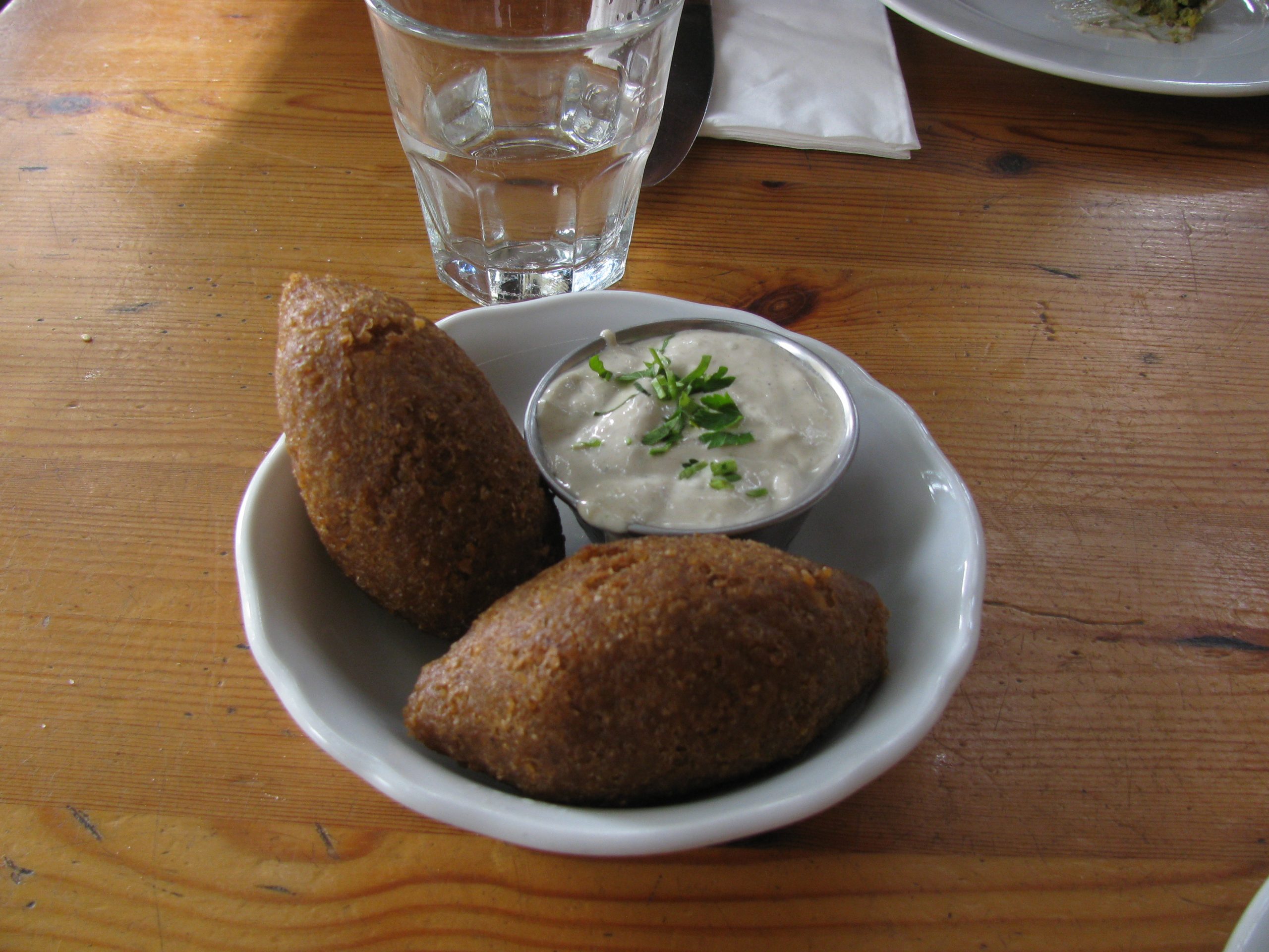 Best Cypriot Food - Best 40 Cypriot Dishes And Food in Cyprus To Try 34 Koobe and tahini sauce scaled