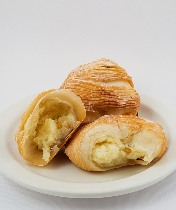 40 Italian Dishes You Must Try Before You Die 32 Sfogliatella, Italian Food, Italian cuisine, traditional Italian food, food in Italy, Italian dishes