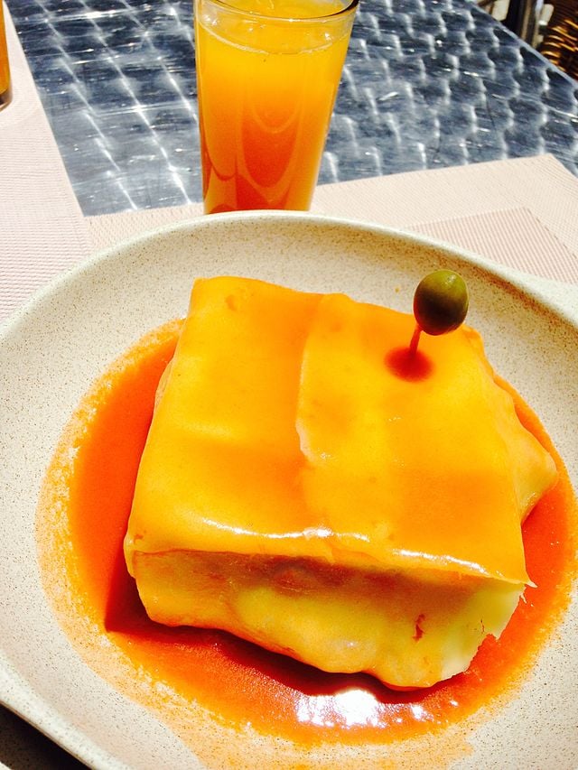 Why Portuguese Food Might Be Europe’s Most Underrated Cuisine: The Best Portuguese Foods Every Traveler Should Try 27 Francesinha, Portuguese Food, Portuguese cuisine, traditional Portuguese food, food in Portugal, Portuguese dishes