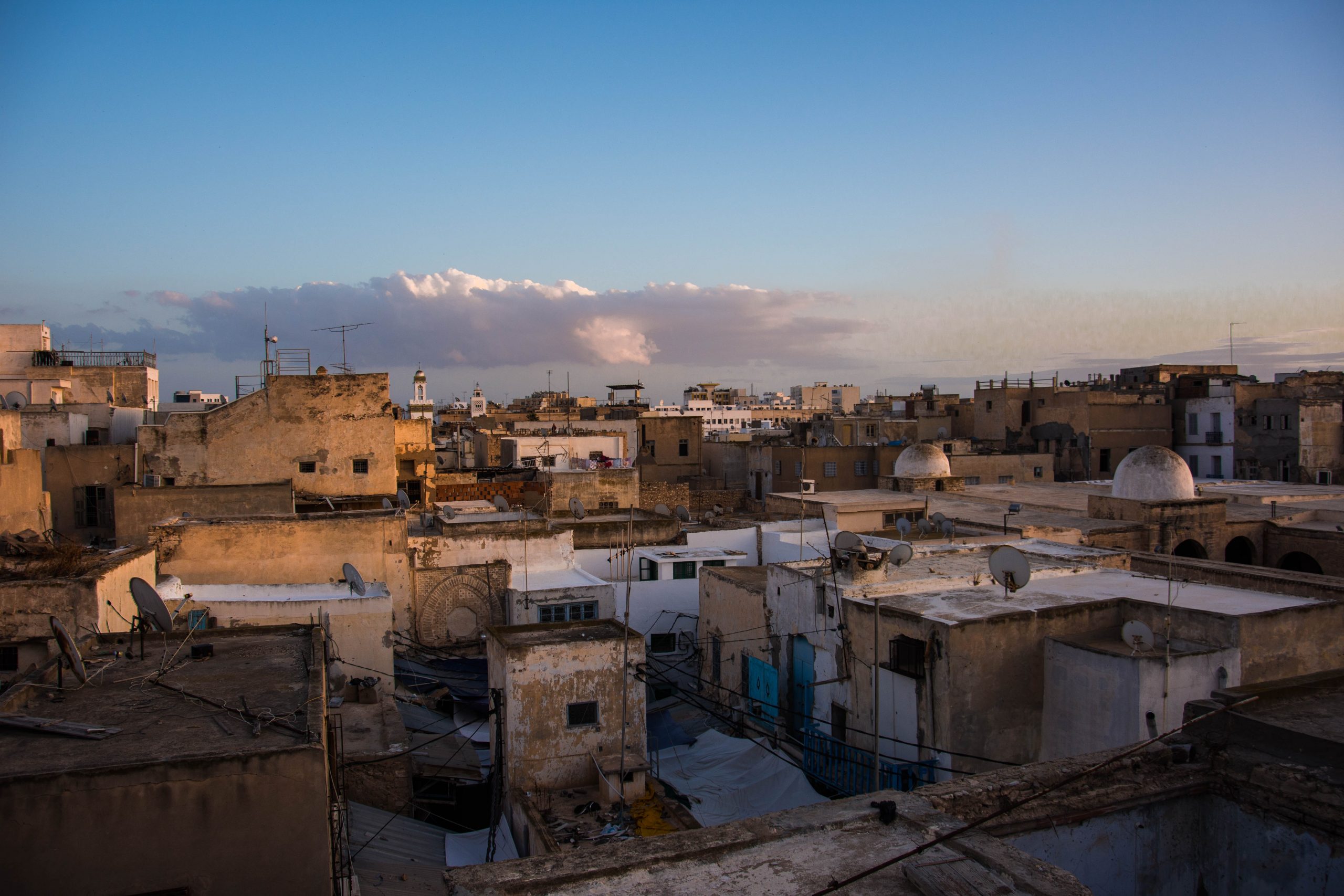 WHAT TO WEAR IN TUNISIA: OUR TUNISIA PACKING LIST AND WHAT TO PACK FOR TUNISIA 4 View of the medina sfax, Tunisie, houses and sky