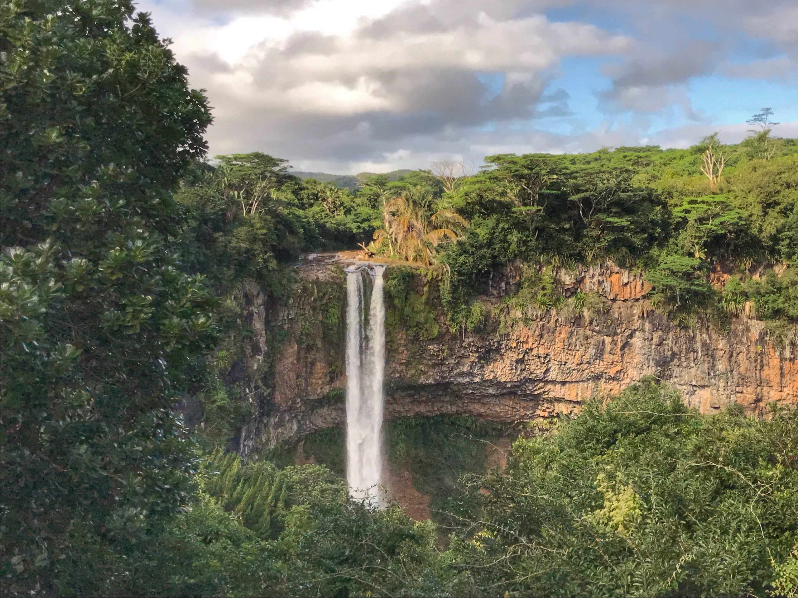 They’ll Pay You to Move There? These 12 Countries Will Pay You to Move There Seriously 7 Waterfall in Mauritius scaled