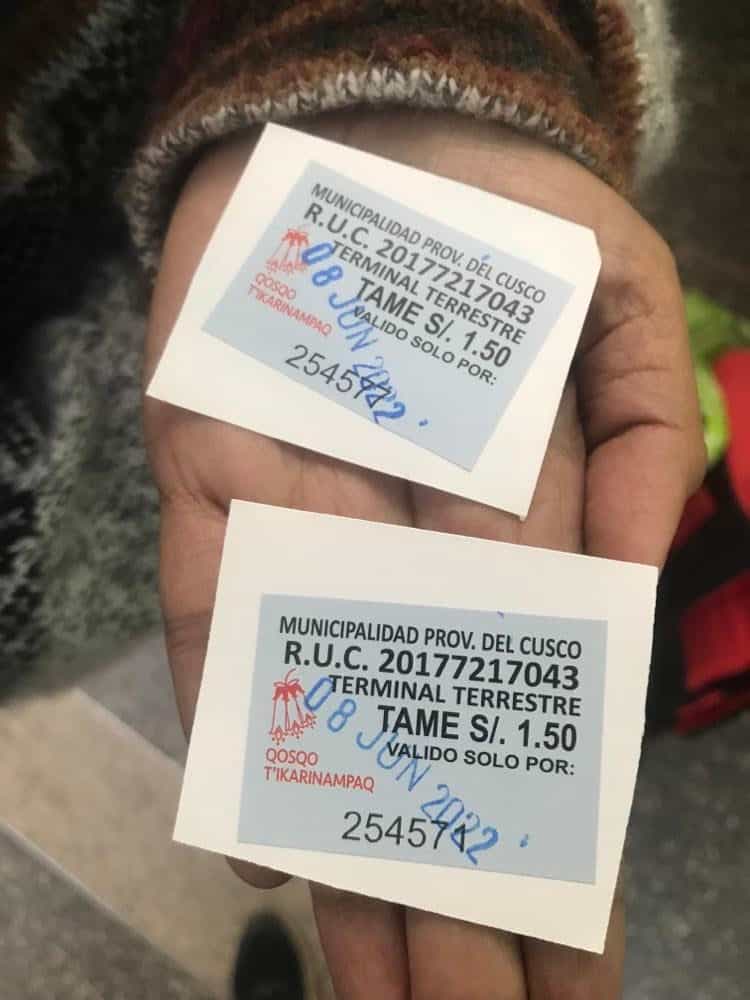 There is an Entrance fee 1.5 PEN per person which is less than half of a dollar at Cusco Bus Terminal before boarding the bus.