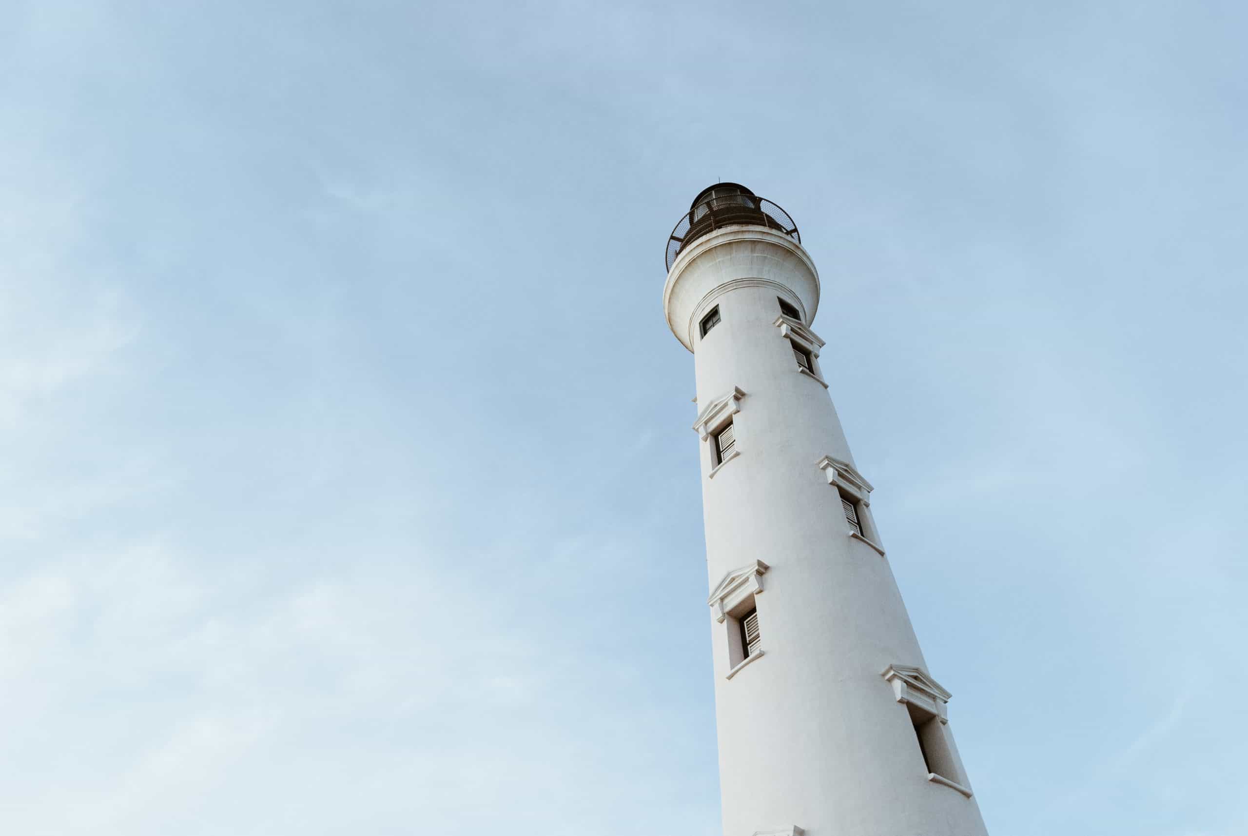 California Lighthouse in Aruba , Barbados vs Aruba - Is Barbados the Better Caribbean Trip?