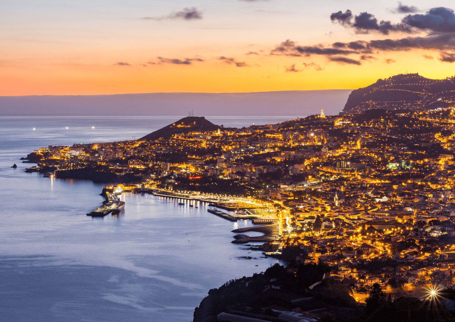Madeira vs Canary Islands: Which is the Better Vacation 3 Sunset over Funchal, Madeira, Madeira vs Canary Islands, Canary Islands vs Madeira