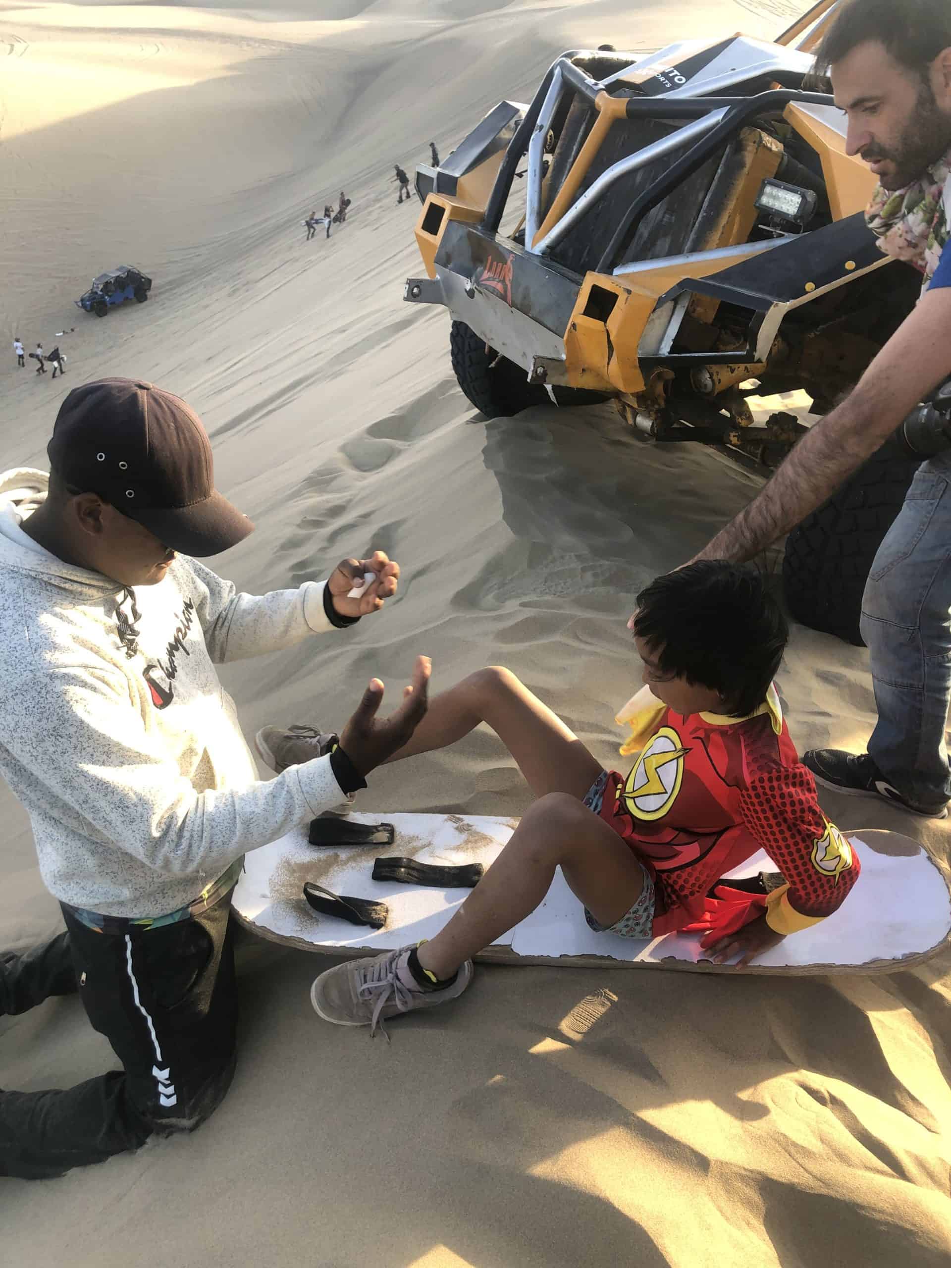 South America Family Vacation: Best Family Vacations in South America 3 Our little one enjoying sandboarding in Peru - South America Family Vacation / Family Vacations in South America