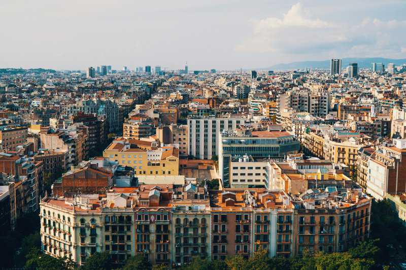 Thinking Of Moving To Spain? Living in Barcelona vs Madrid: Compare Lifestyle and Travel Costs 2 The beautiful roofs in Barcelona Living in Madrid vs Barcelona scaled