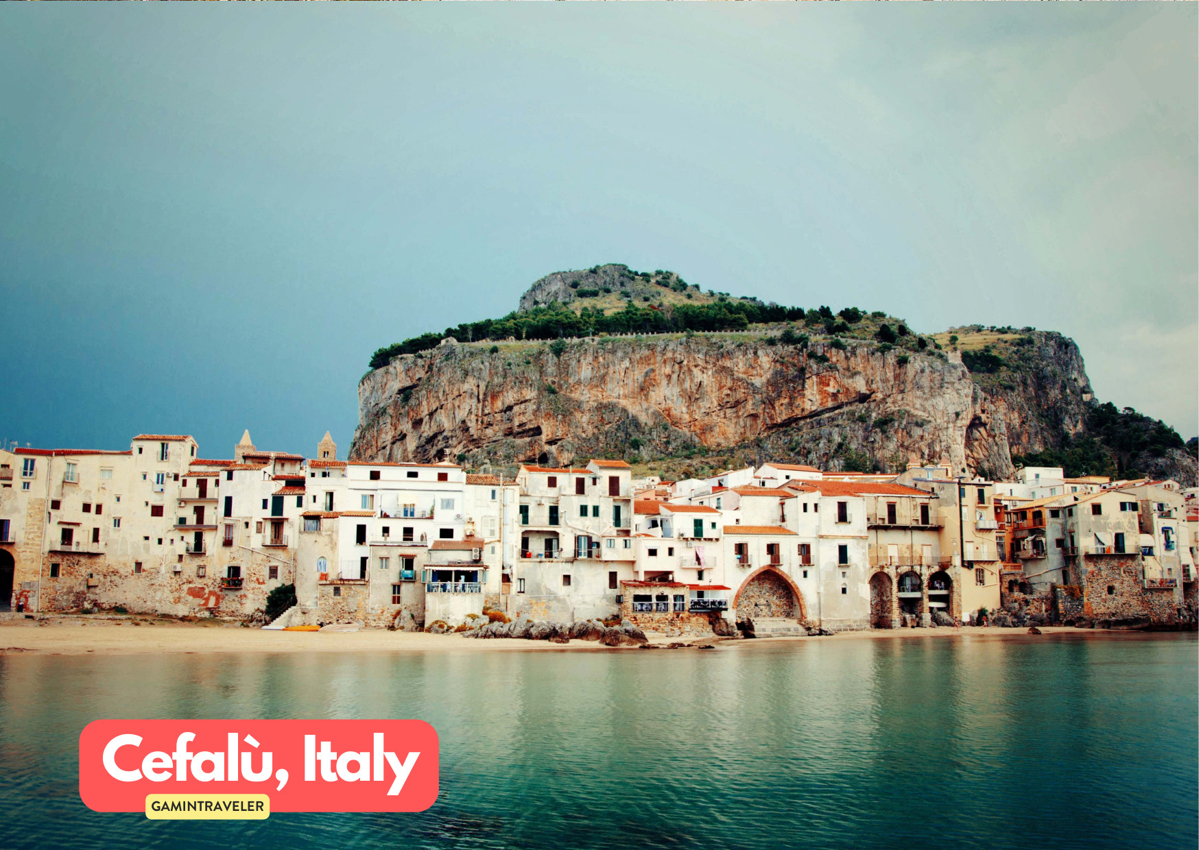10 Alternative Mediterranean Retreats to Avoid the Crowds This Year 4 a group of buildings on a beach in Cefalu Italy