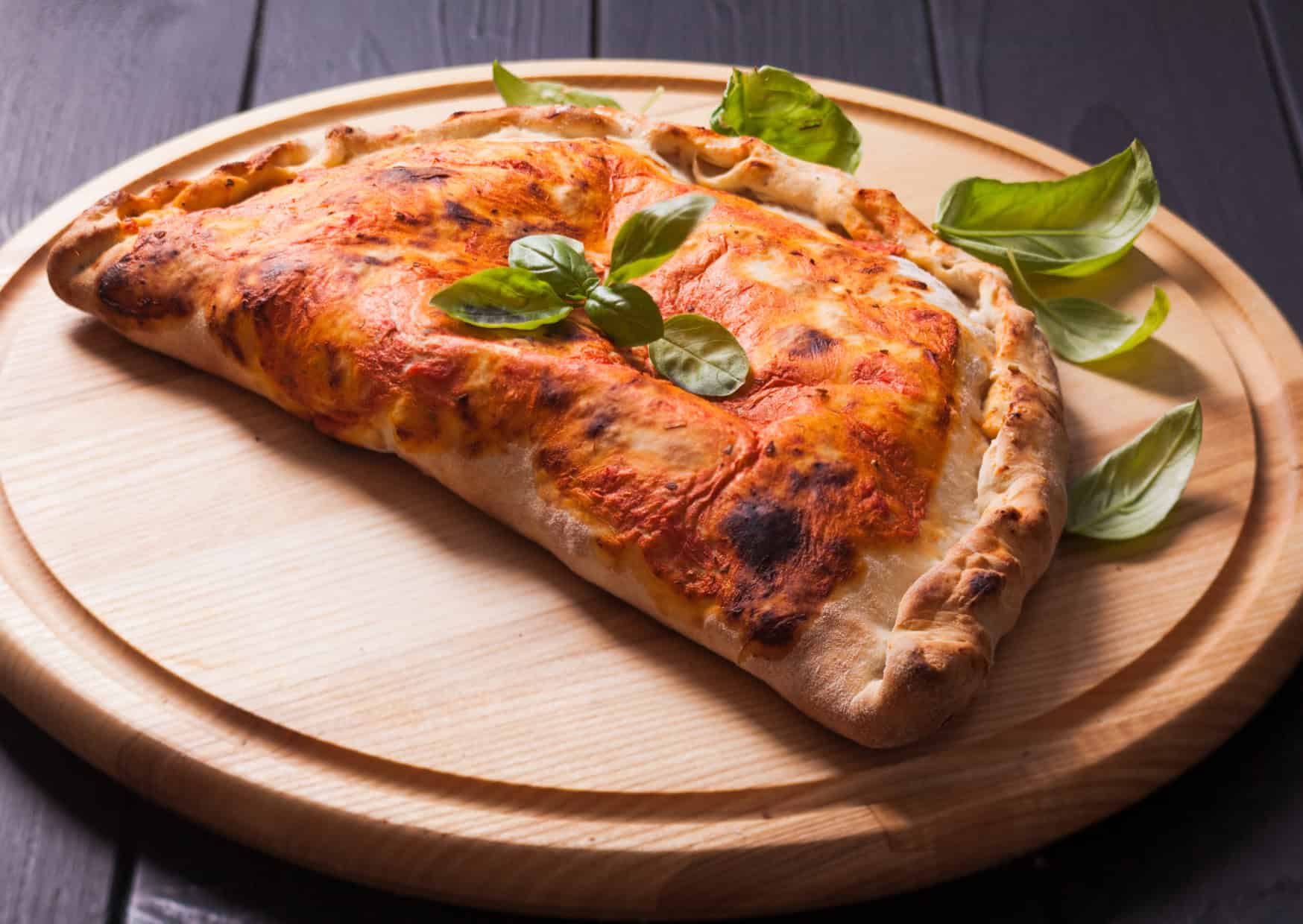 Why Italians Get Angry When They See 10 Italian Recipes Americans Changed So Much Italians Barely Recognize Them 5 Calzone with ham 10 Italian Recipes That Americans Changed Are They Better