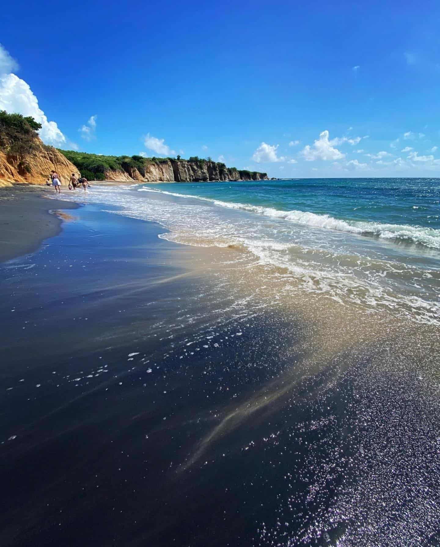 10 Best Caribbean Beaches Beyond the Tourist Traps to Visit 9 Playa con Negra Puerto Rico