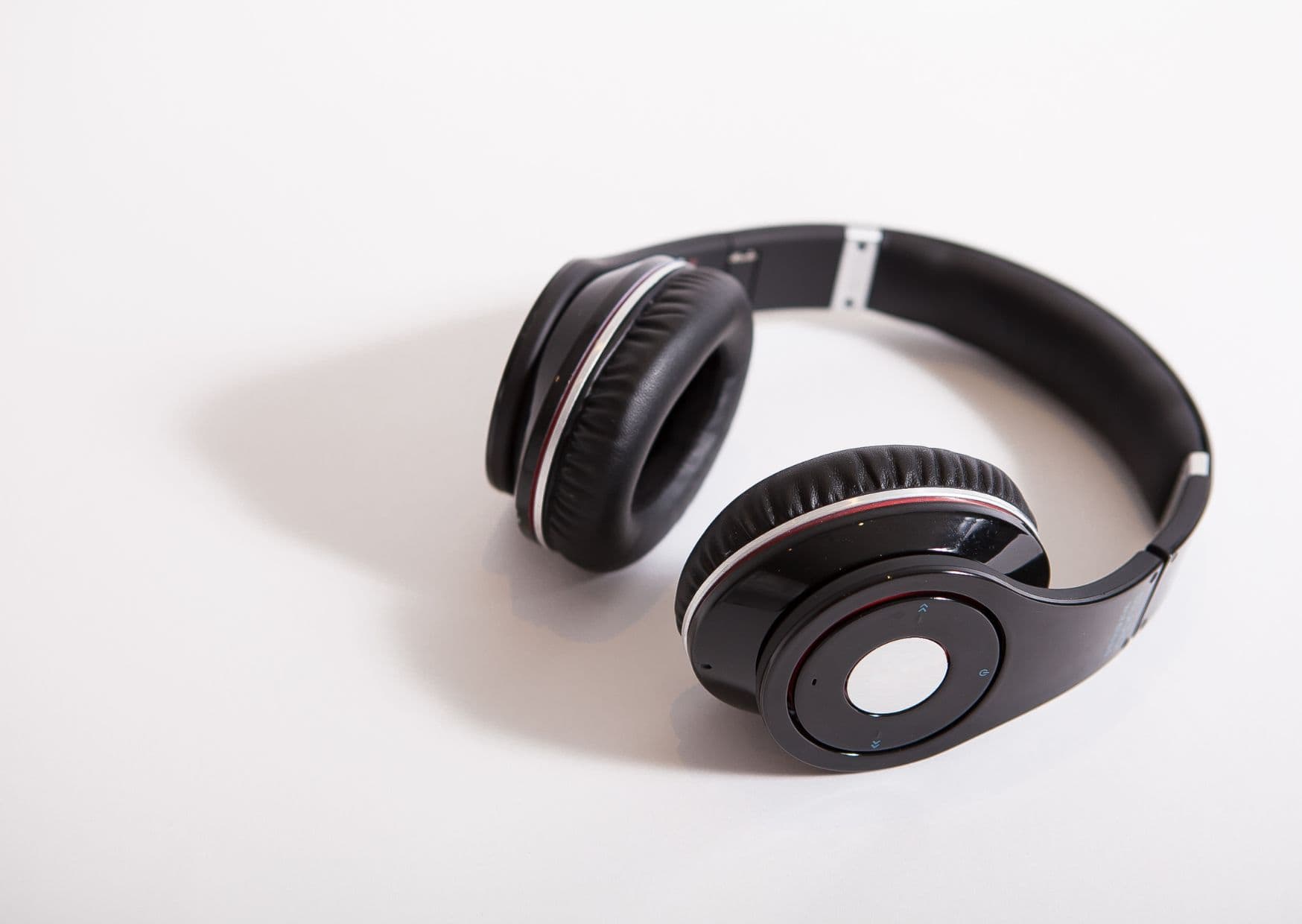Noise-Canceling Earbuds or Headphones