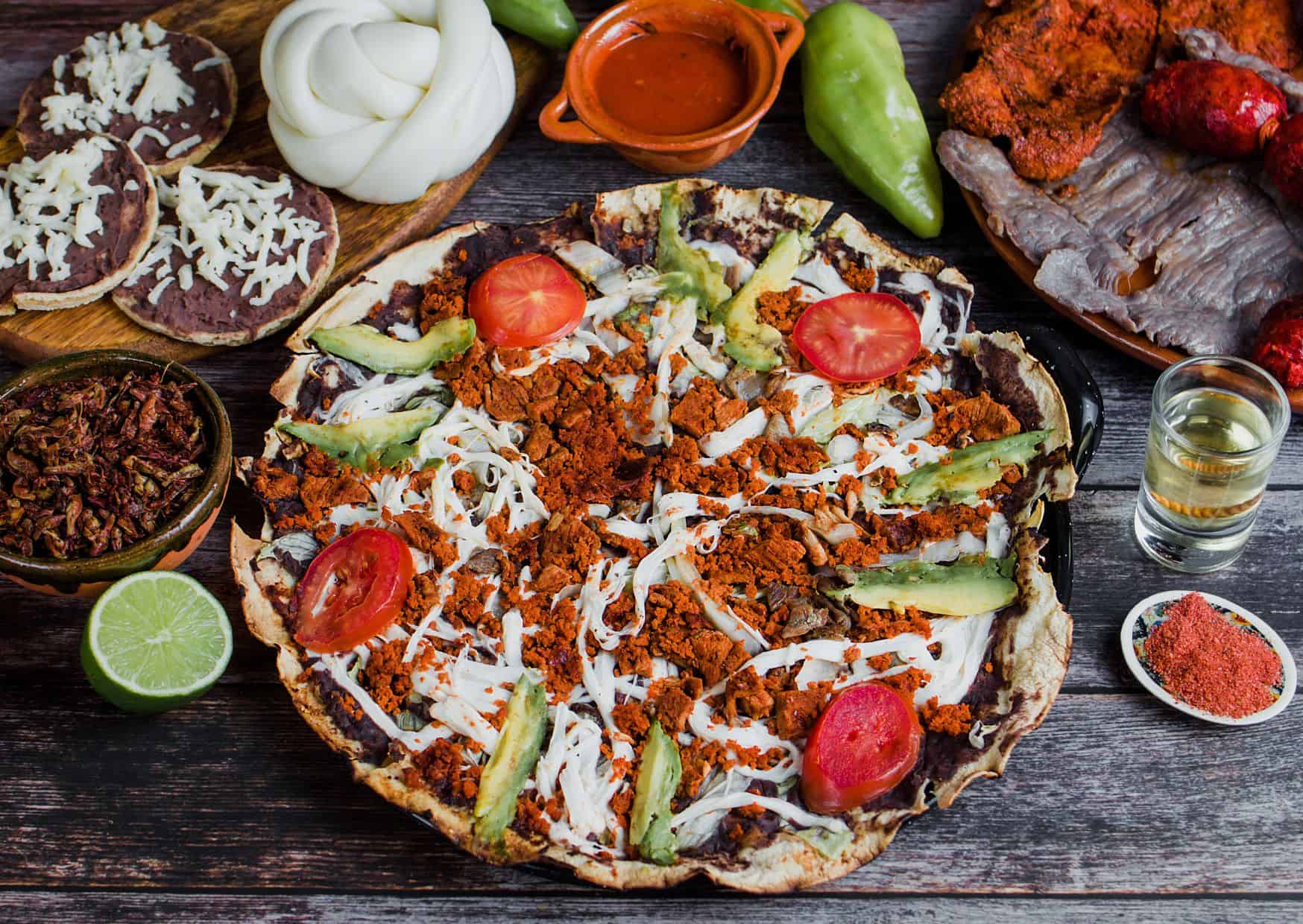 Why These Mexican Street Foods Taste Better Homemade: 10 Mexican Street Foods You Need to Try 3 10 Best Street Food Dishes to Try in Mexico (Recipe Guide), Most Popular Foods In Mexico: How To Make Tlayudas (Recipe Guide), Forget About Tacos In Mexico And Try These 15 Foods Instead (Recipe Guide)