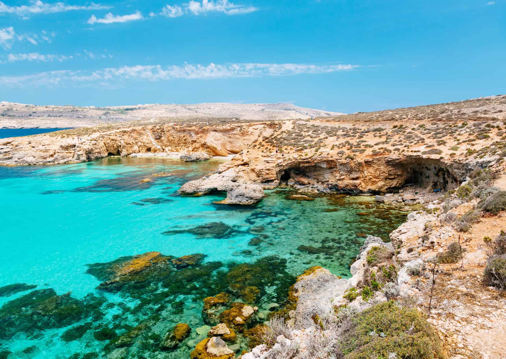 Want a New Passport? 15 Cheapest Countries Where Americans Can Buy Citizenship And Build A New Life Abroad 8 Comino Blue Lagoon Malta 13 ‘Secret Offbeat European Beaches Youd Swear Are in the Caribbean