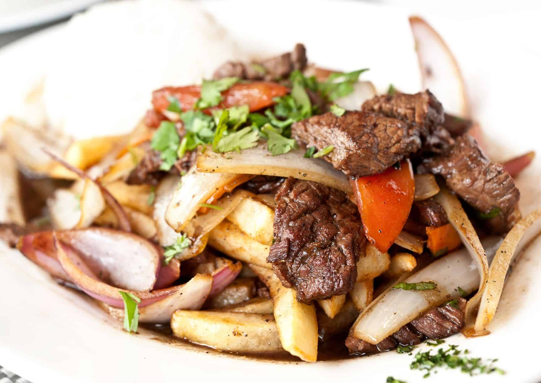 How Peruvian Cooks Make Lomo Saltado So Savory and Addictive 4 Most Delicious Foods In Peru: How to Make Peruvian Lomo Saltado (Recipe Guide)