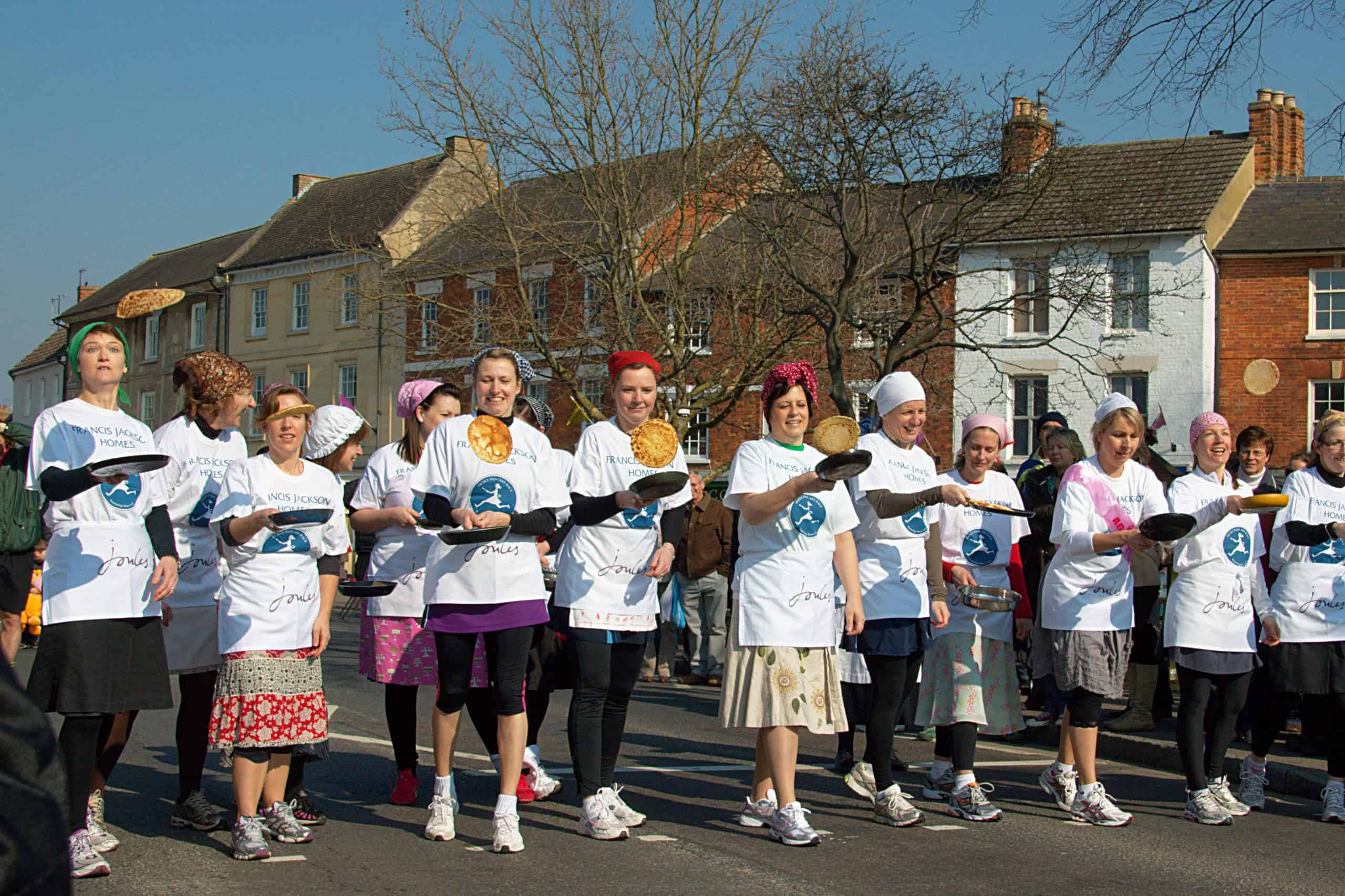 Why These 11 Quirky European Festivals Are 100x More Fun Than the Tourist Traps You Know 11 Olney Pancake Race – Buckinghamshire scaled