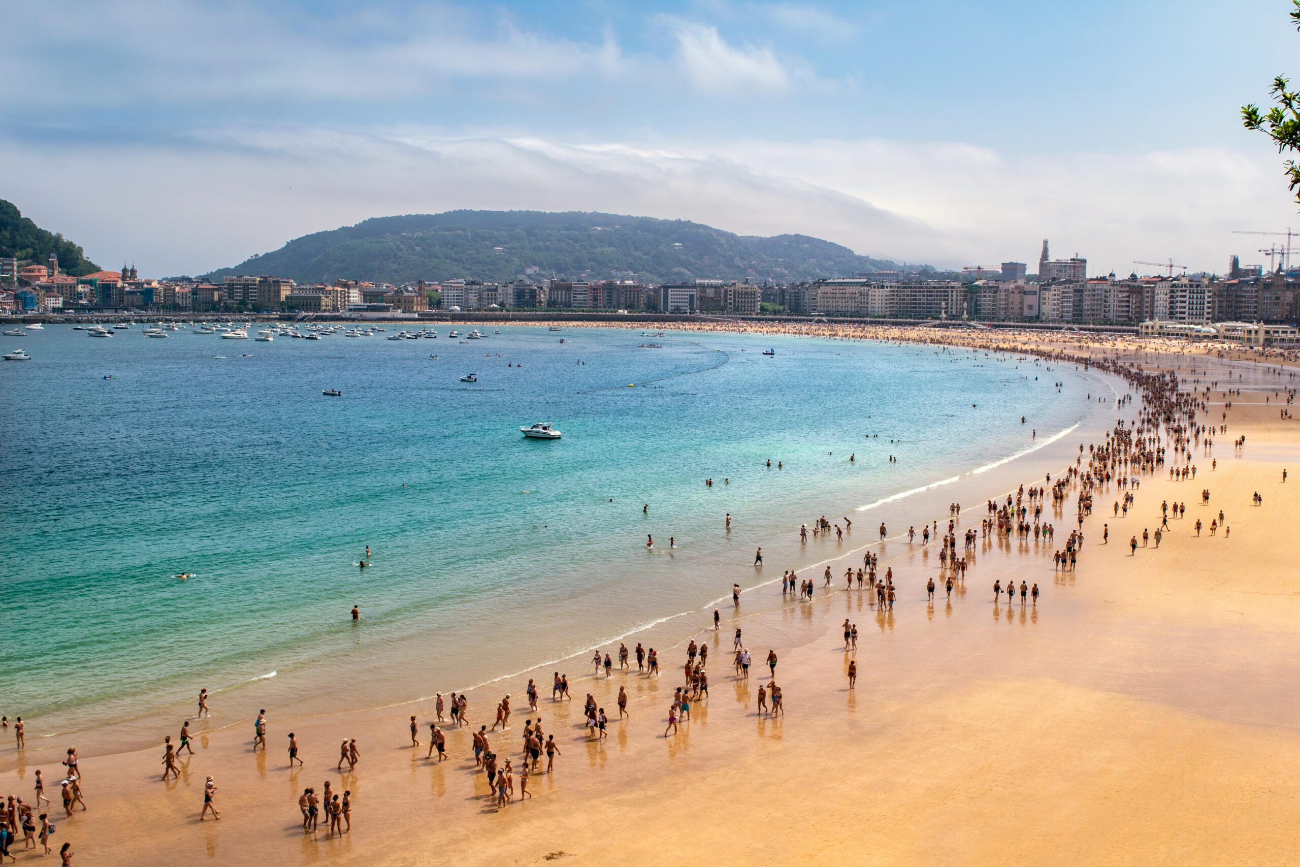 Raising a Child in Spain Costs €300 Monthly — Americans Pay $2,000 7 family in Spain 11 san sebastian scaled