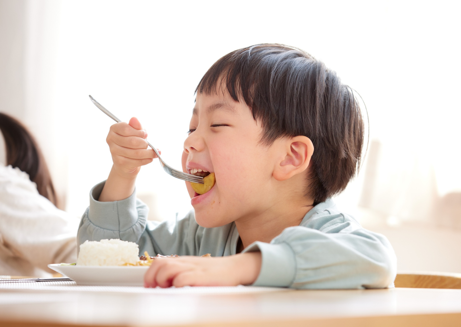 Japanese people eating rice