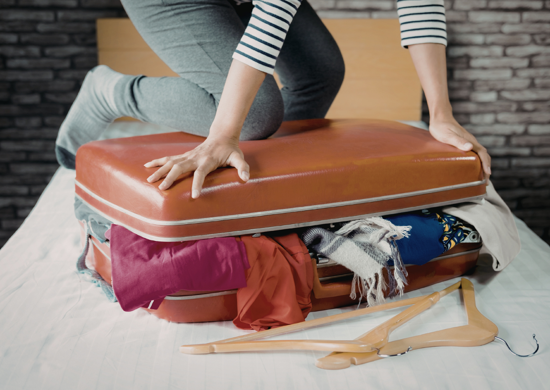 The One-Minute Suitcase Trick That Could Save You Money at the Airport 1 packing luggage 3